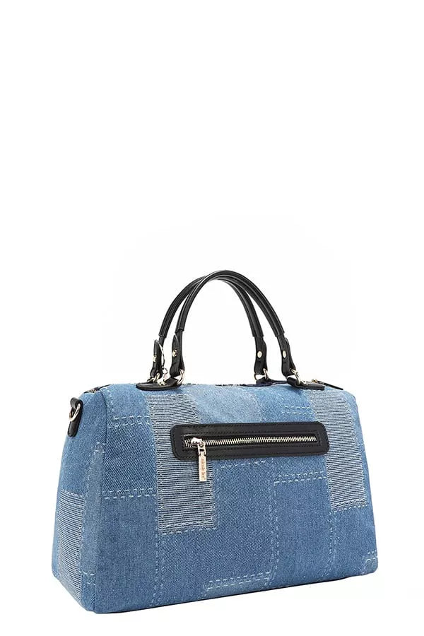 The "Bosque de Amor" Denim Boston Bag adds a mystical, boho-chic touch to your style, perfect for those who want their look to stand out.