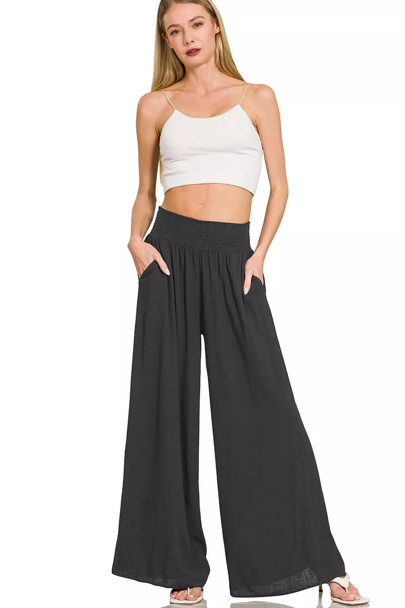 Crafted for those who refuse to compromise between comfort and polish, these wide-leg lounge pants feature a smocked waistband that moves with you. The relaxed cut drapes elegantly without sacrificing structure, while the breathable fabric keeps you comfortable from morning to evening. A refined essential that elevates casual dressing with quiet sophistication.
