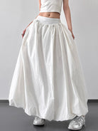 Experience stylish comfort with the Elastic Waistband Bubble Maxi Skirt. Featuring a stretchy waistband that adjusts to your body for a seamless fit, this skirt’s unique bubble design adds a fashionable and flattering touch. Ideal for both relaxed outings and more formal events, it easily adapts to your style, becoming a must-have piece in your closet.