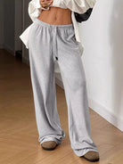 Stay comfy and stylish all day with these Drawstring Wide Leg Pants! Made from a stretchy mix of 95% polyester and 5% spandex, they move with you, never holding you back. The adjustable drawstring lets you find your perfect fit, while handy pockets keep your essentials close without adding bulk. Their wide-leg cut is flattering and fun, great for everything from casual strolls to chill workdays. Plus, the wrinkle-resistant fabric means you’ll look fresh no matter where the day takes you. Effortless style ha