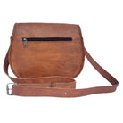 Brown leather shoulder bag on a white background