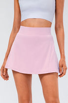 Lavender High Waisted Pleated Active Skirt. Designed for style and performance, this skort features tummy control and a pocket for convenience